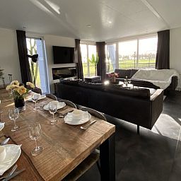Spacious living room of detached house in Biddinghuizen, overlooking the green landscape in Eastern Flevoland, Flevoland.