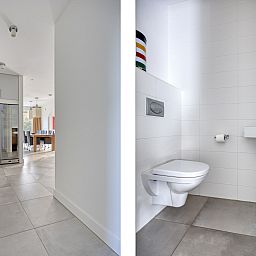 Interior of the Detached House in Zeewolde, Flevoland, with modern hall and toilet, ideal for a comfortable stay.