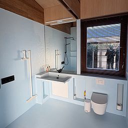 Cozy interior of vacation home FR527 in Boijl, Friesland with modern furnishings and views of the Frisian forests.