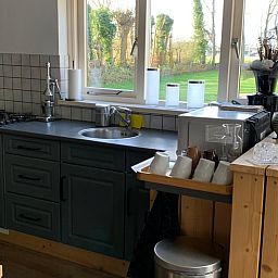 Modern kitchen in Holiday home in Steggerda, overlooking the Frisian nature.