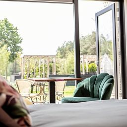 Relax in the bright indoor space of Holiday Home in Blesdijke overlooking the nature of Friesland.