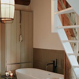 Luxury bathroom amenities in Holiday home in Altforst, Gelderland, create a relaxing atmosphere in this charming vacation home.