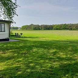 Ferienhaus in Zelhem mit schoener Aussicht auf gruene Weiden in der Region Achterhoek, ideal fuer einen erholsamen Aufenthalt in Gelderland.