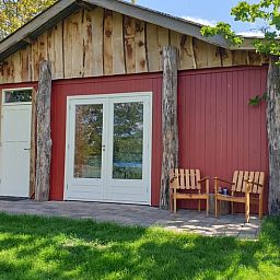 Rustic cottage in Westendorp with wooden details, in the middle of Achterhoek, Gelderland.