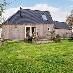 Aerial photo of Holiday cottage in Laren, located in the green fields of Achterhoek, Gelderland, surrounded by nature and tranquility.