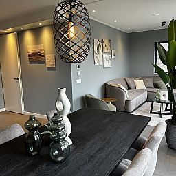 Cozy sitting area in Chalet in Lochem, ideal for relaxation in Achterhoek, Gelderland.