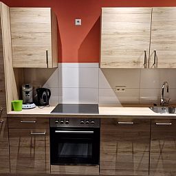 Moderne keuken in Vakantiehuisje in Wichmond, Achterhoek, compleet uitgerust voor een aangenaam verblijf.