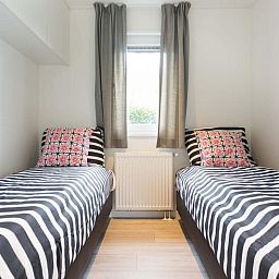 Zweites Schlafzimmer mit zwei Einzelbetten in Parel Ferienhaus fuer 4 Personen, Lichtenvoorde, Achterhoek, Gelderland.