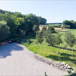 Das Ferienhaus in Zeddam bietet einen herrlichen Blick auf die gruene Umgebung von Achterhoek, Gelderland, mit ueppiger Natur und Ruhe.