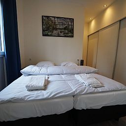 Gemtliches Schlafzimmer in einem freistehenden Haus in Olburgen, Achterhoek, Gelderland, mit bequemem Bett und ruhiger Einrichtung.