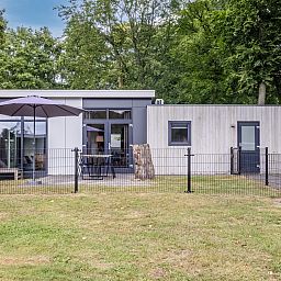 The Butterfly Farm vacation home in Kring van Dorth, Achterhoek, Gelderland with terrace and modern outdoor space surrounded by green nature.