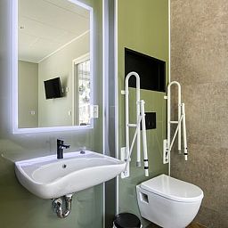 Stylish bathroom of Veluwehoeve 4 persons MIVA in Ede, Veluwe, with modern amenities and accessible design.