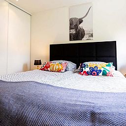 Gemuetliches Schlafzimmer im Ferienhaus fuer 3 Personen, Ede, Veluwe, Gelderland, mit gemuetlicher Einrichtung.