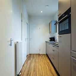 Modern kitchen of Module Limited Edition, a vacation home located in Ede, Veluwe, Gelderland.