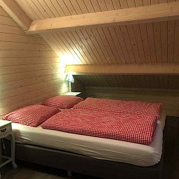 Gemuetliches Esszimmer im Ferienhaus DG1298, Emst, Veluwe mit viel Licht.
