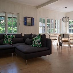 Cozy living room of Holiday home in Emst, Veluwe, with modern decor and lots of natural light in Gelderland.
