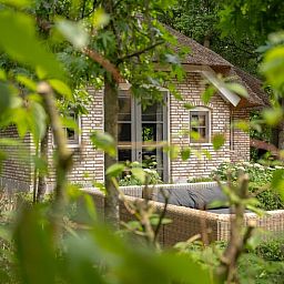 Cozy terrace at Cottage in Ermelo, vacation home in wooded Veluwe, Gelderland.