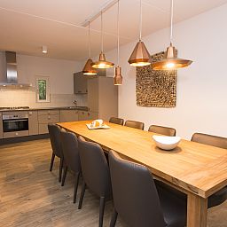 Modern living room with fireplace in Miggelenberg bungalow, Hoenderloo, Veluwe, Gelderland.