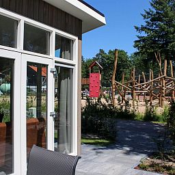 Playground view from Holiday home Heidehoeve comfort in Hoenderloo, Veluwe, Gelderland.