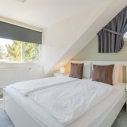 Helles Schlafzimmer im Ferienhaus Pimpelmees in Hulshorst, Veluwe mit bequemem Doppelbett.