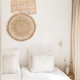 Attractive bedroom in Cottage in Nunspeet, Veluwe, Gelderland with natural decorations and soft bedding.