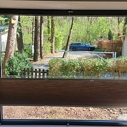 View from Cottage in Hattemerbroek, Veluwe vacation rental on green surroundings.