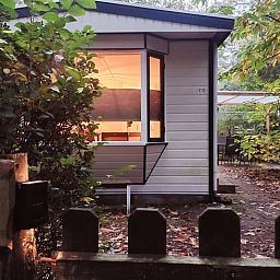 Spacious dining area in Cottage in Hattemerbroek, Veluwe vacation home for cozy meals.