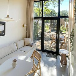 Bright living room Holiday cottage in Lieren overlooking Veluwe.