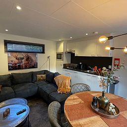 Stylish living room of Cottage in Lieren with open kitchen, Veluwe, Gelderland.