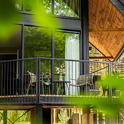 Geniessen Sie den Whirlpool in der Nature Villa mit Whirlpool & Sauna, Wekerom, Veluwe. Ideal fuer einen romantischen Aufenthalt.