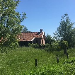 Rustieke vakantieaccommodatie in Overschild omgeven door natuur in Groningen.