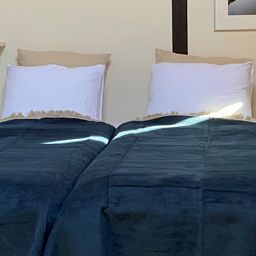 Comfortabele tweepersoonskamer in Vakantiehuisje in Molenrij, ideaal voor een ontspannen verblijf.