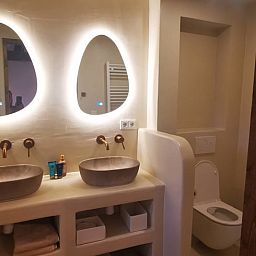 Bright attic space in Holiday home in America, North Limburg, with skylight and wooden elements.