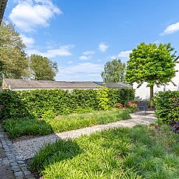 Blick aus dem Wohnzimmer des Huisje in Merselo, Ferienhaus in Nord-Limburg mit Gartenblick.