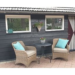 Cozy indoor area of Holiday Home in Heythuysen, North Limburg, with a bright living room and comfortable seating.