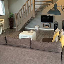 Gezellige woonkamer van Vakantiehuisje in Heythuysen, Noord Limburg, Limburg.