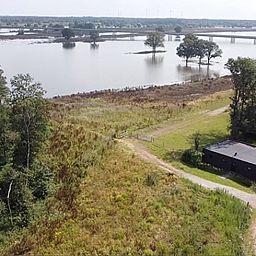 Aerial view of Cottage in Wanssum, vacation home in Limburg overlooking the river.