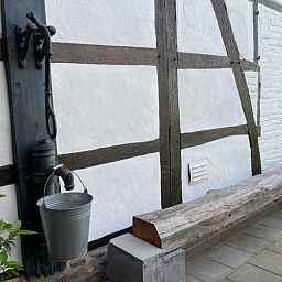 Modern bathroom in vacation home L243 in Mechelen, South Limburg with shower and toilet.