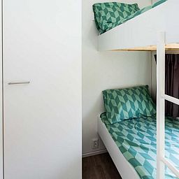 Knusse slaapkamer met stapelbed in Module Special 6 personen Wellness, ideaal voor gezinnen in Schin op Geul, Zuid Limburg.