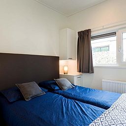 Komfortables Schlafzimmer in Modul Spezial fuer 6 Personen, Schin op Geul, Suedlimburg, bietet erholsamen Schlaf.