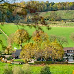 Prachtig uitzicht op de groene omgeving vanuit Vakantiehuis in Gulpen, Zuid Limburg.