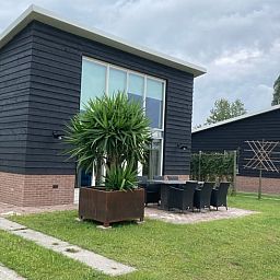 Gemuetliche Sitzecke im Ferienhaus in Venhorst, De Peel, Nordbrabant.