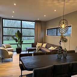 Stylish living room of Detached house in Kaatsheuvel, North Brabant overlooking green surroundings.