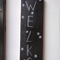 Welcome sign in Cottage in Kaatsheuvel, charming vacation home in North Brabant.