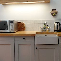 Modern kitchen in Cottage in Kaatsheuvel, vacation home in the heart of Brabant.