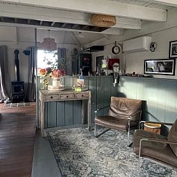 Comfortable sitting area in Cottage in Hank, vacation home in Heart of Brabant, North Brabant, ideal for relaxation.