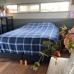 Cozy bedroom in Cottage in Hank, vacation home in Heart of Brabant, North Brabant, with comfortable bed.