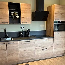 Modern kitchen in Cottage in De Moer, vacation home in Heart of Brabant.