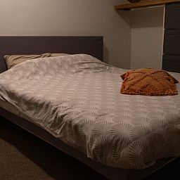 Cozy bedroom in Holiday home in Best, Heart of Brabant, North Brabant, with comfortable double bed for a relaxing stay.