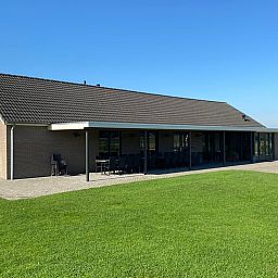 Huisje in Nistelrode, een vakantiehuis in Noordoost Brabant met ruime veranda en groen uitzicht.